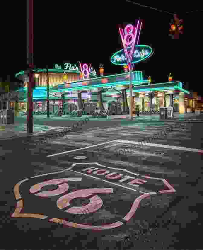 A Vintage Car Cruising Down Route 66, Surrounded By The Iconic Neon Signs And Roadside Attractions. The Route 66 Photo Road Trip: How To Eat Stay Play And Shoot Like A Pro