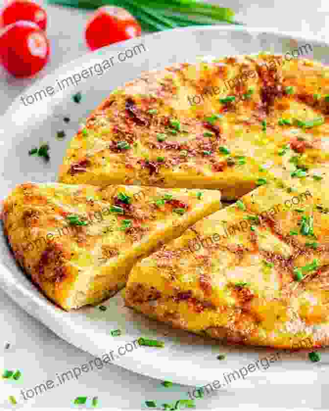 Tortilla De Patatas: Thick Spanish Omelet Made With Potatoes And Eggs Top 10 Spanish Tapas How To Cook Spanish Cuisine